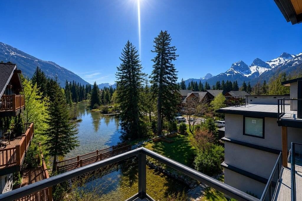Balcony view overlooking river and mountains